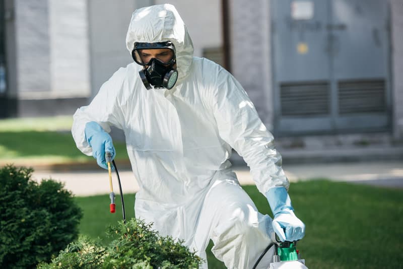 spray merit using protective clothing
